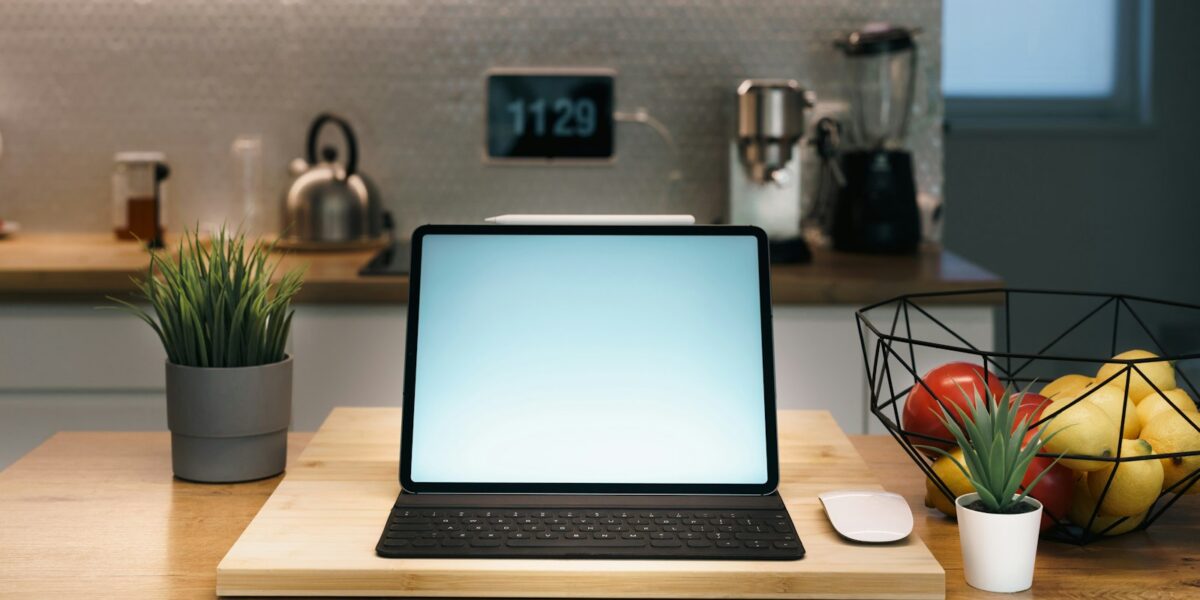 Smart touchscreen display on a kitchen counter, similar to Apple's new HomeView hub